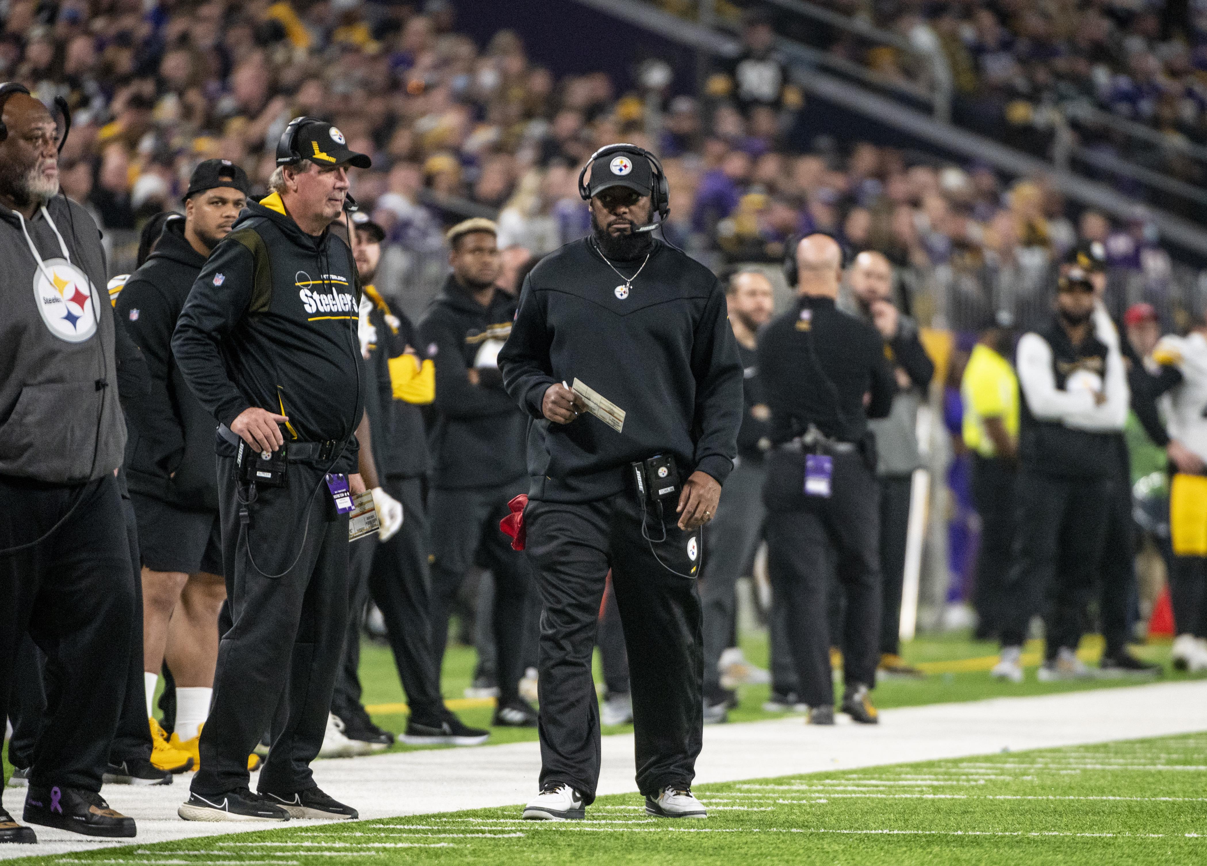 Head Coach Mike Tomlin walks the sidelines during recent game.