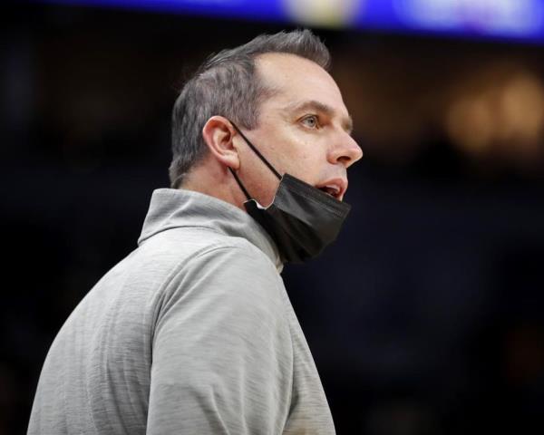 Los Angeles Lakers head coach Frank Vogel questions a referee in an NBA basketball game with the Minnesota Timberwolves on Friday, Dec. 17, 2021, in Minneapolis. The Timberwolves won 110-92.